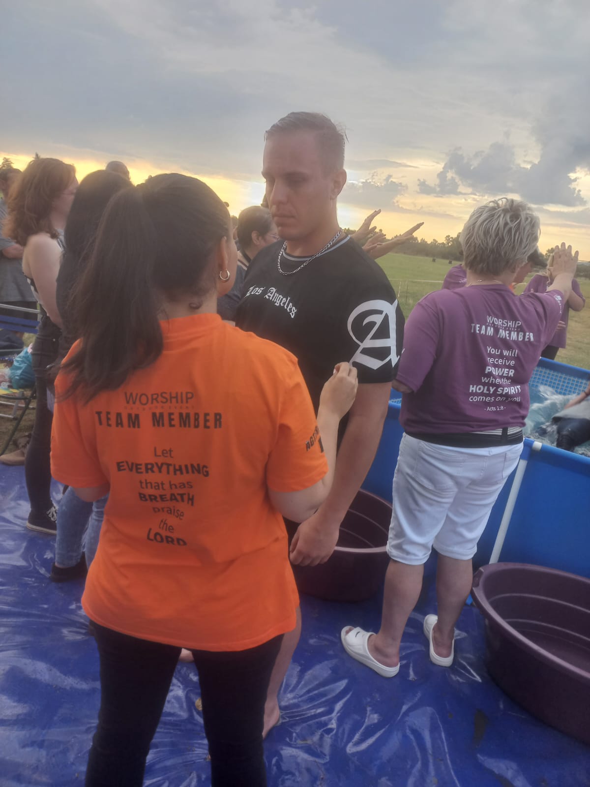 Jeandre getting a prophetic word from the ministry team